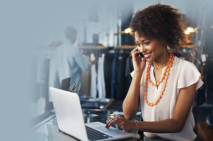 A young business owner on the phone